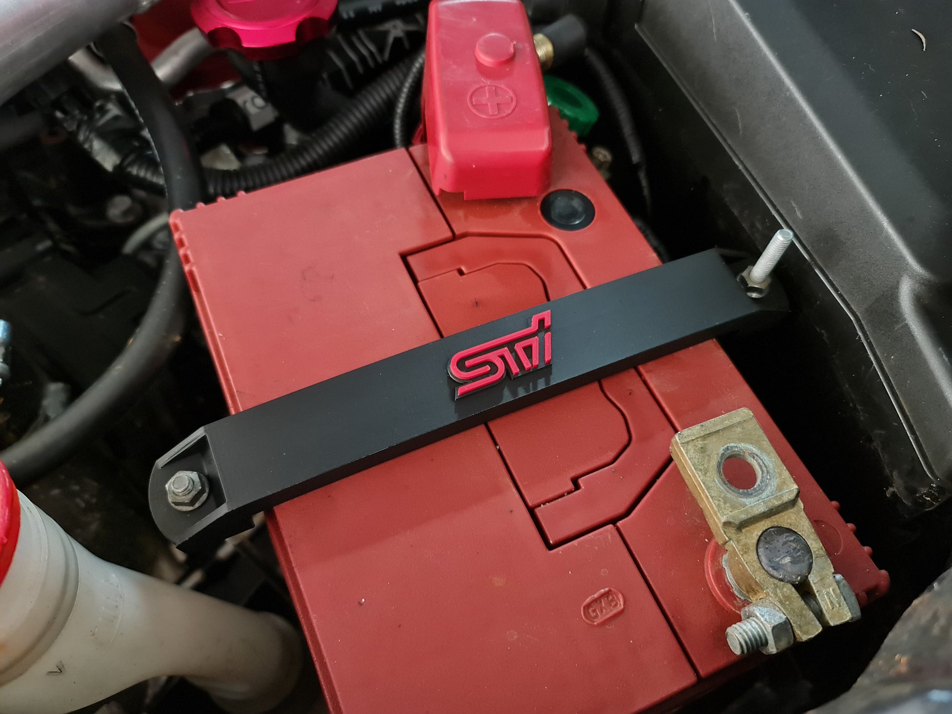 Subaru battery tie down image 3
