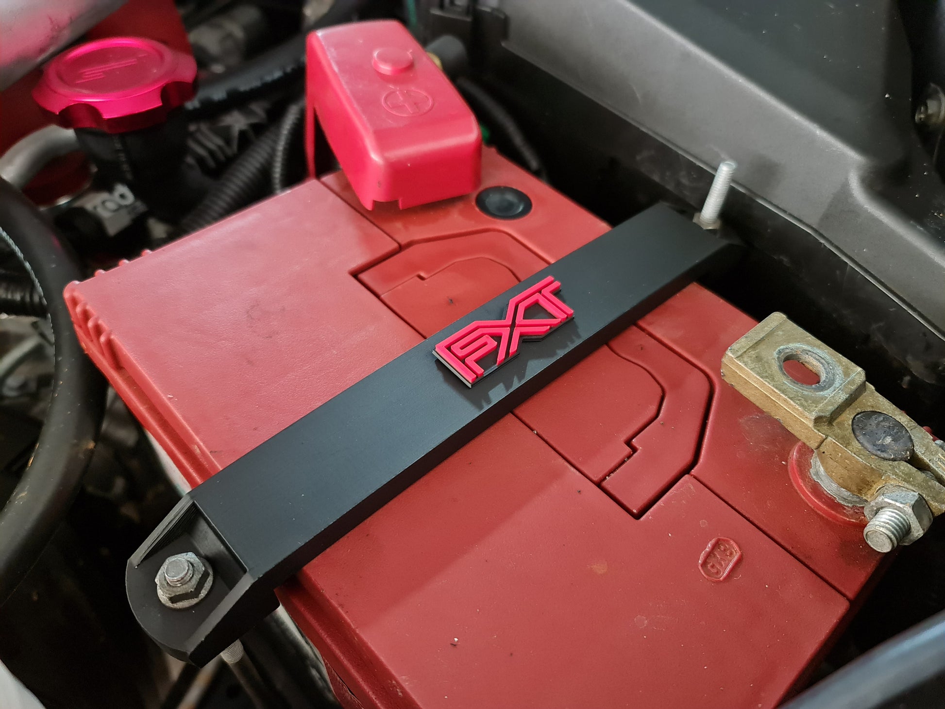 Subaru battery tie down image 6