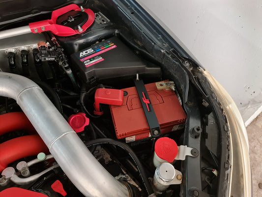 Subaru battery tie down image 1