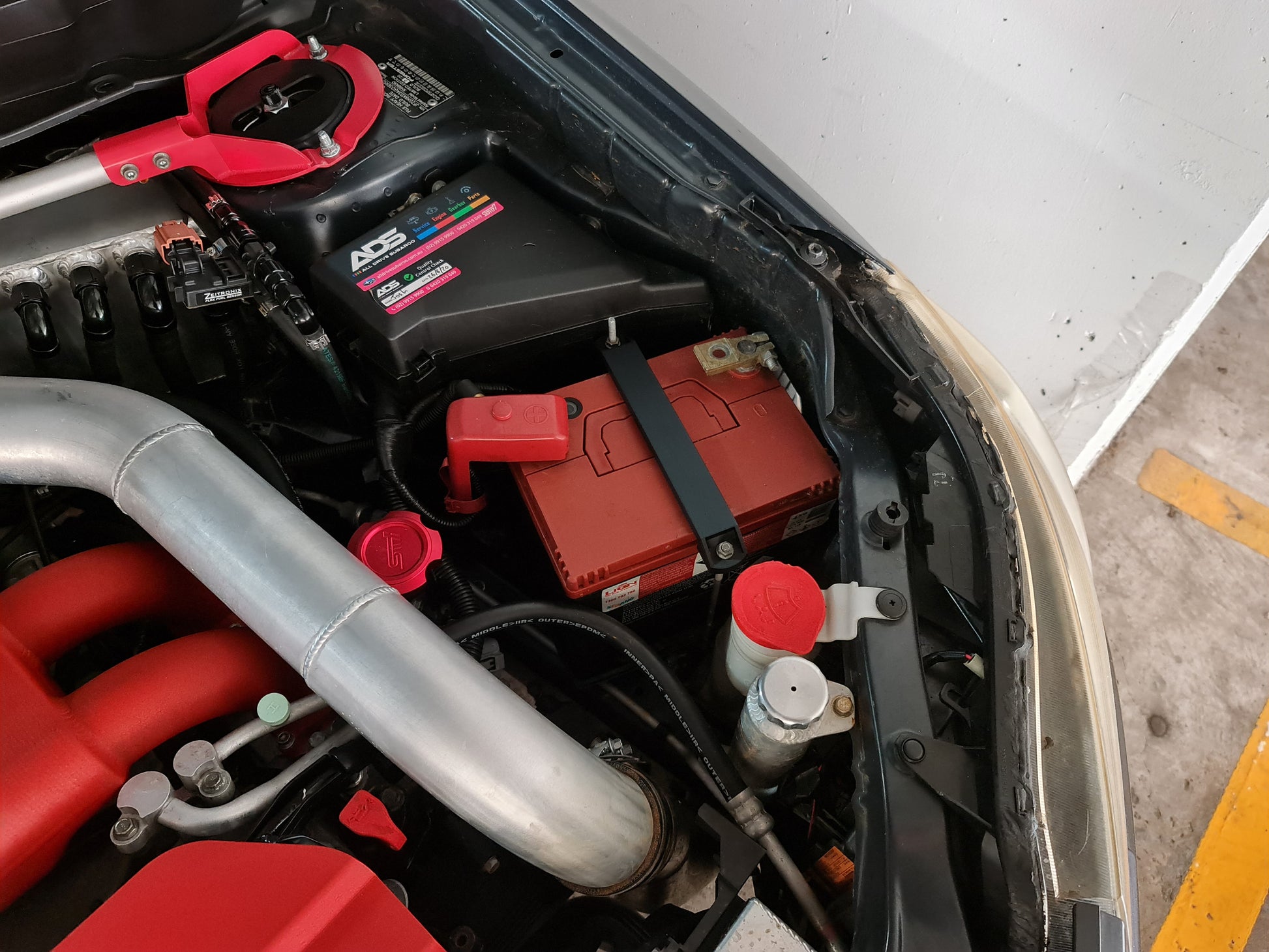 Subaru battery tie down image 9