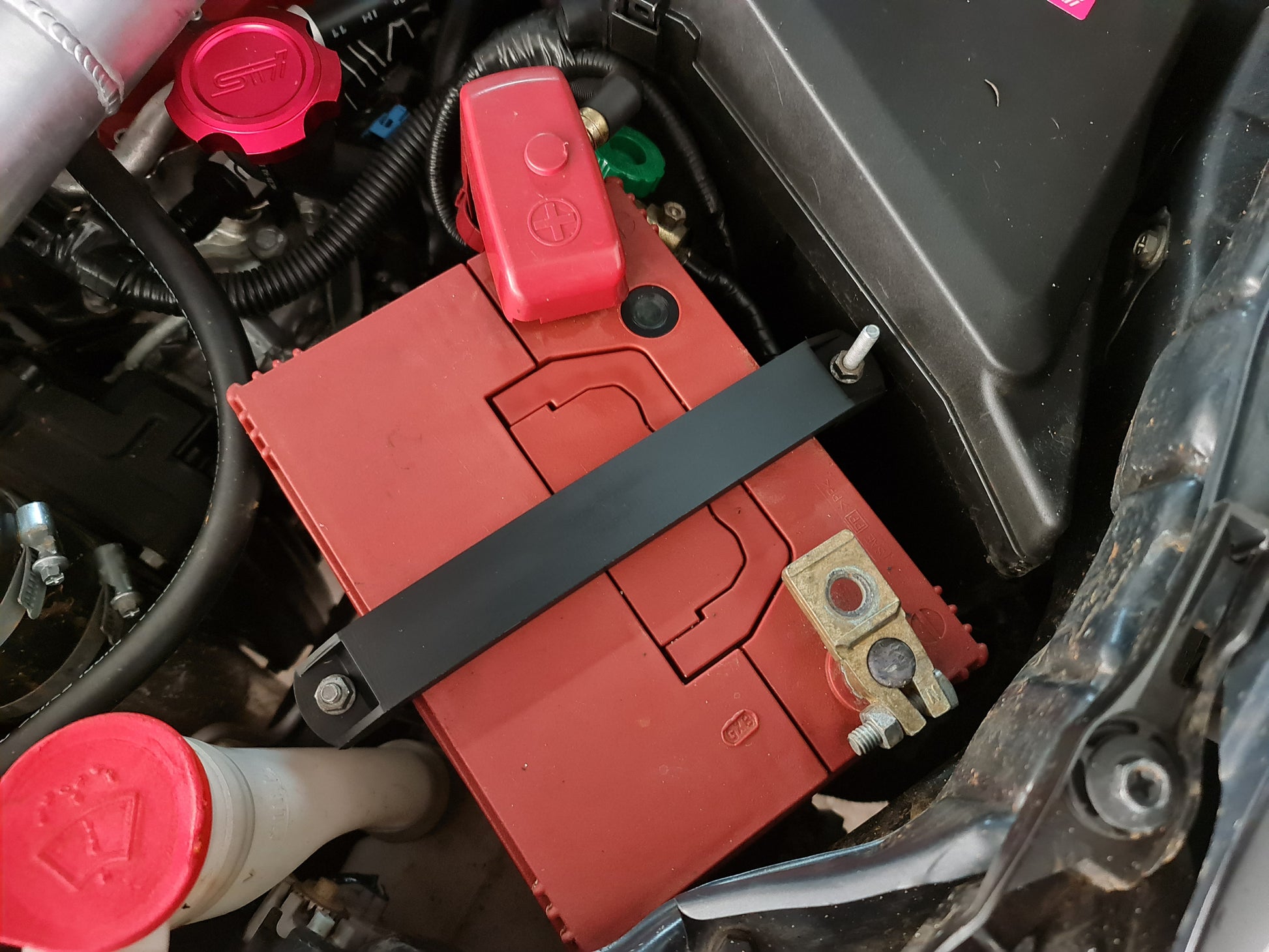 Subaru battery tie down image 8