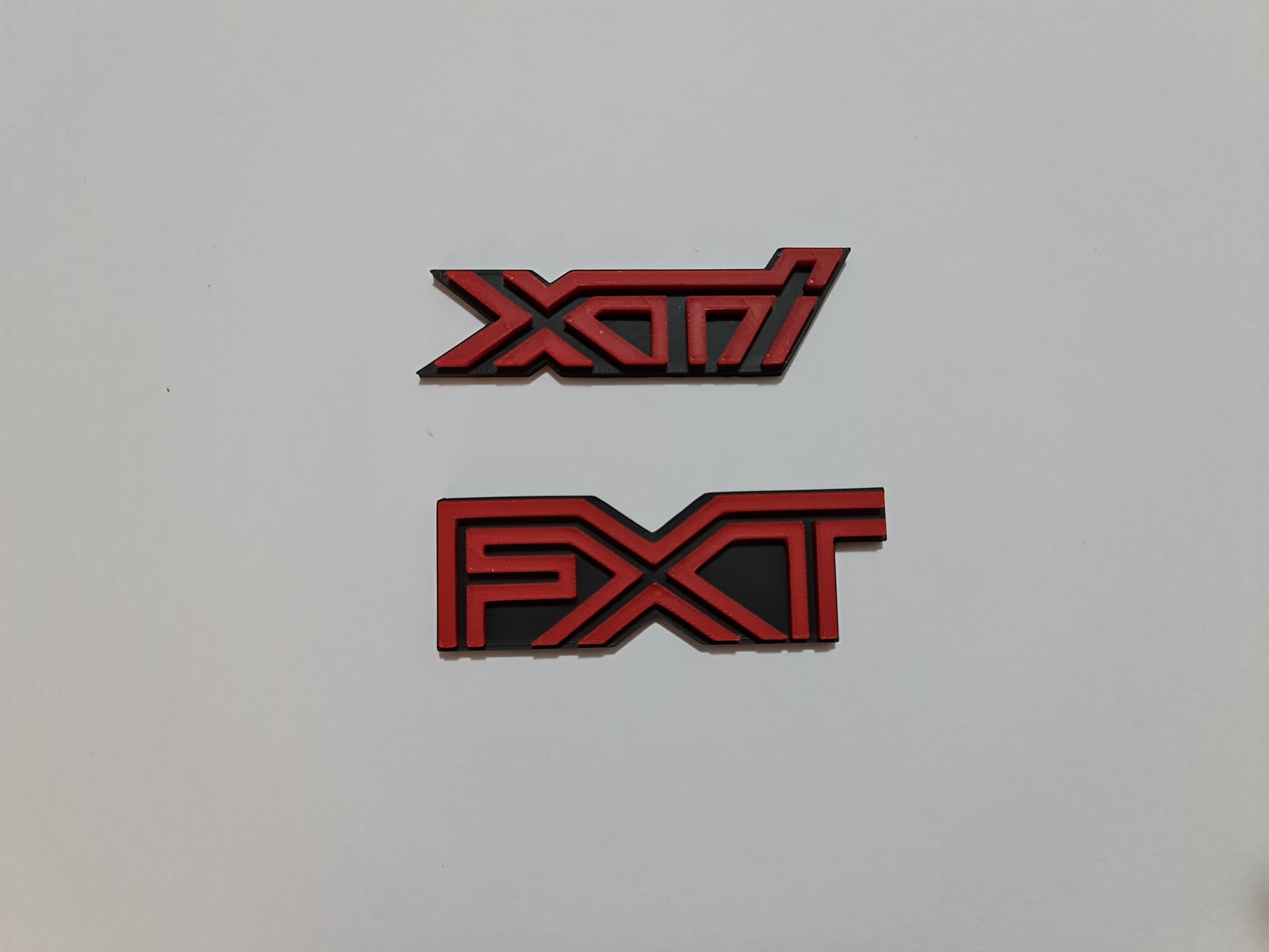 XTi XVi FXT badges image 2