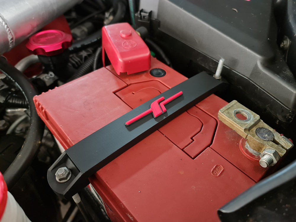 Battery Tie Down with Badge for Subaru
