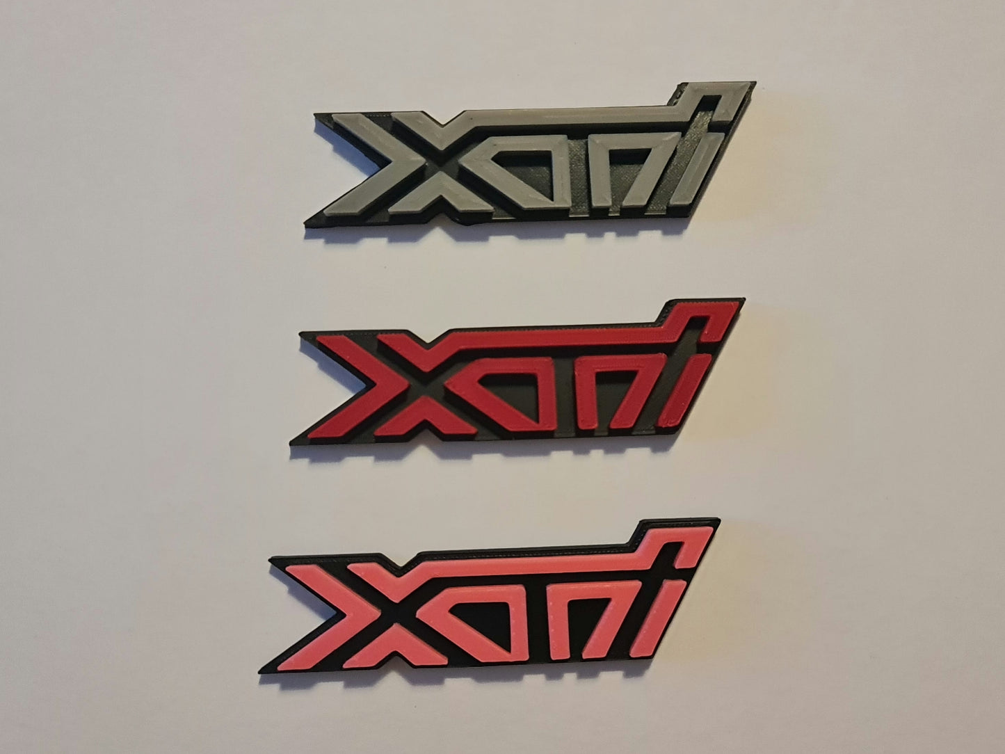 XTi XVi FXT badges image 0
